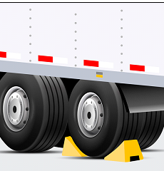 The image illustrates a semi-truck's dual rear wheels securely chocked with yellow wheel chocks, ensuring the vehicle remains stationary. The chocks are placed snugly against the tires on a concrete surface. The side of the truck's white trailer is partially visible, detailed with red and white reflective tape for increased visibility and safety.